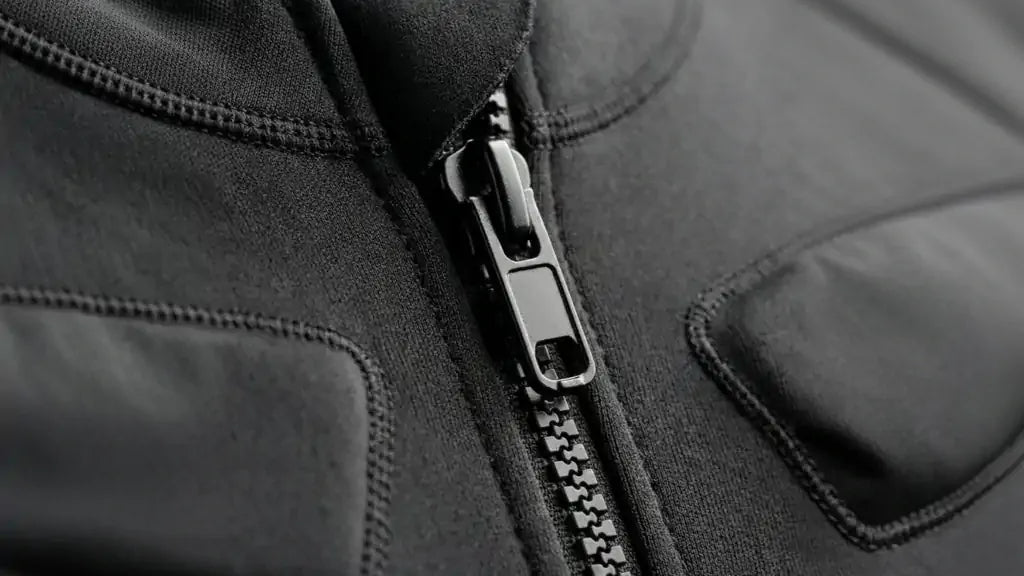Close up of the Visionbody EMS suit front zip and chest electrode pads