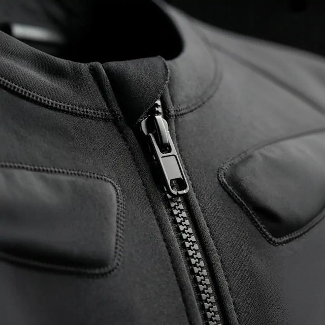 Close up of the Visionbody EMS suit front zip and chest electrode pads